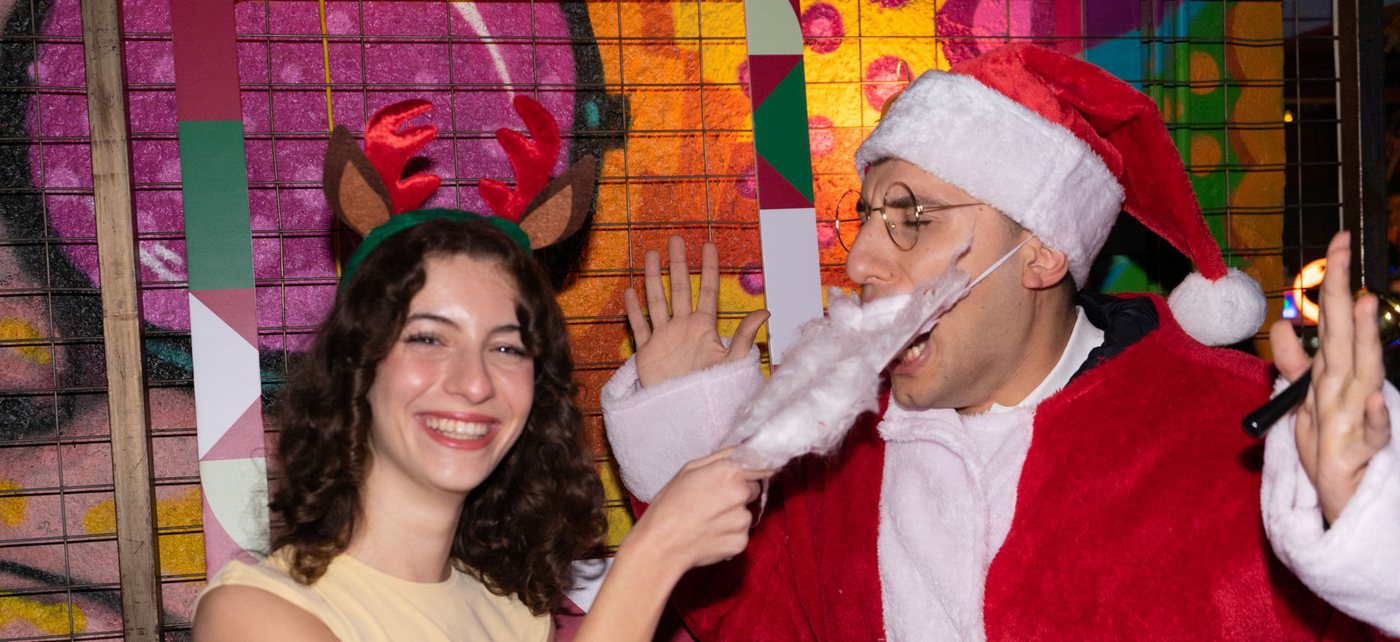 Students with Santa at an IMSOG Christmas party