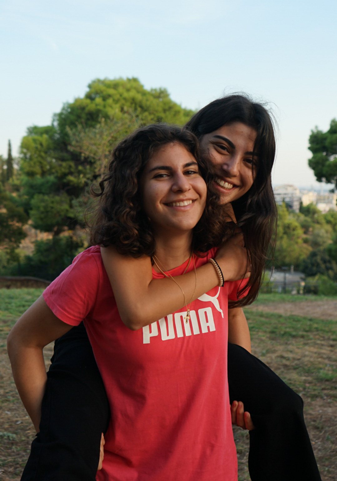 Two IMSOG members laughing at a picnic